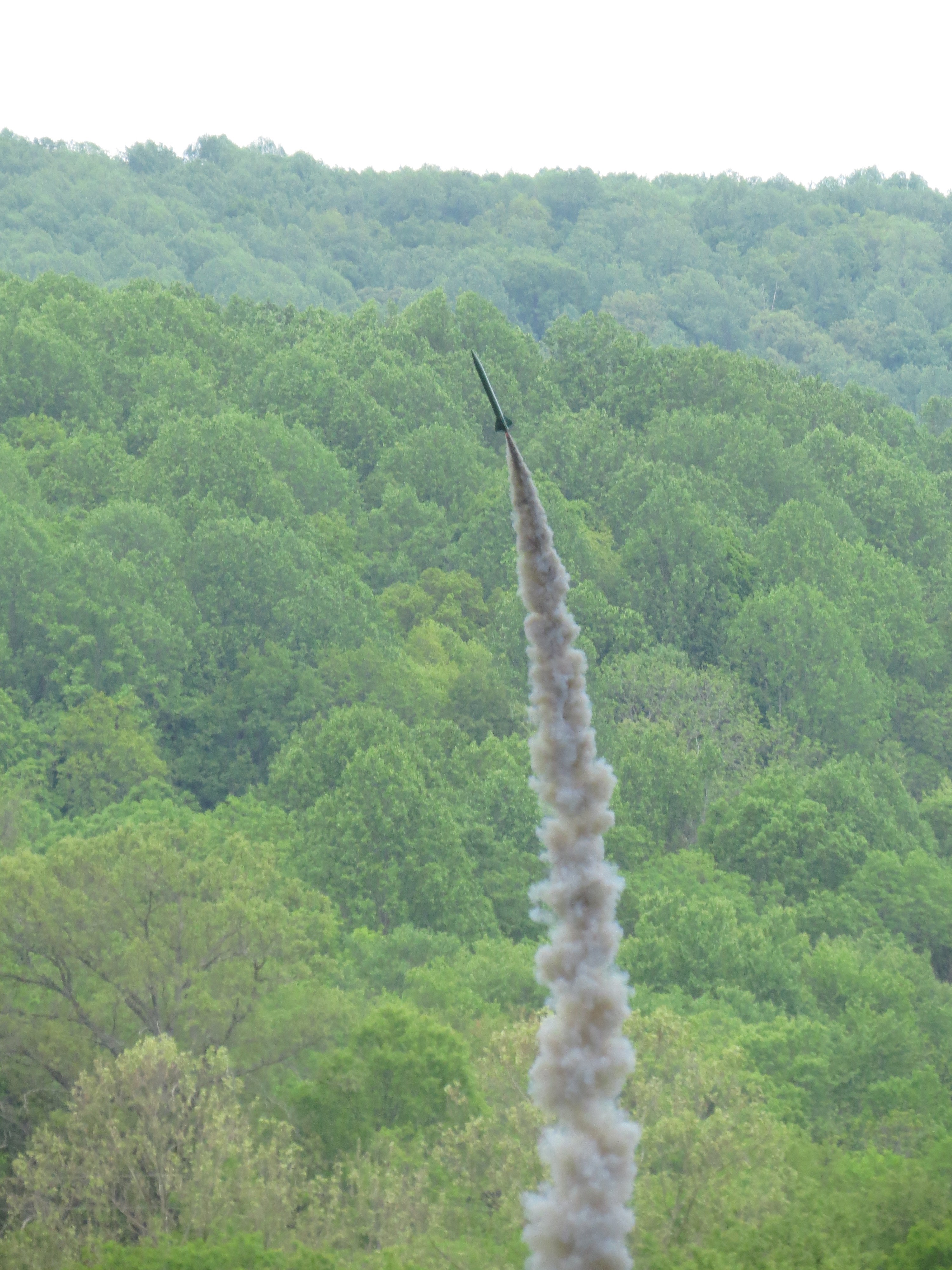 rocket with black smoke